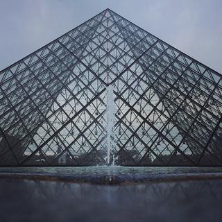 A fountain in front of the Louvre in Paris. 